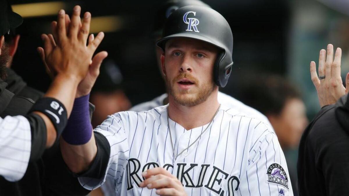 The Colorado Rockies’ Trevor Story hit six home runs in his first four games this season, sending baseball statistcians scurrying to their calculators to project his season total. Story homered twice in his next 10 games. ... Story is congratulated by teammates after scoring during a major league baseball game against the San Francisco Giants on Thursday, April 14, 2016, in Denver.