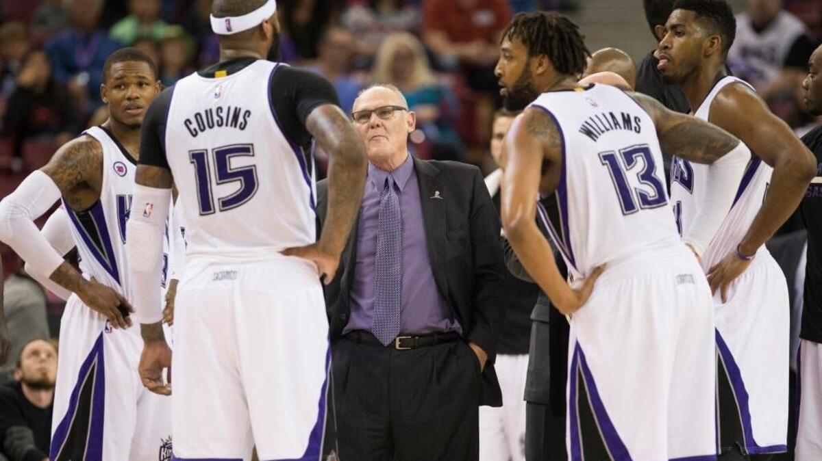 Sacramento Kings coach George Karl talks to team during one of its seemingly endless timeouts during an NBA basketball game against the Utah Jazz on Sunday, April 5, 2015 at Sleep Train Arena in Sacramento.