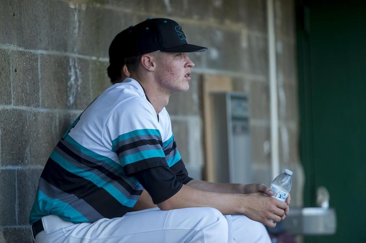Former Sheldon High School pitcher Matthew Manning sits on the bench during the fourth inning as Sheldon faces Woodcreek in a playoff game at Sacramento City College in 2016. Hill is competing for a spot in the Detroit Tigers rotation.