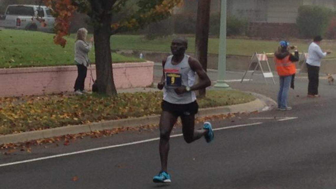 
Jacob Chemtai cruises past the mile 24 mark on his way to victory in the California International Marathon on Sunday in Sacramento.
