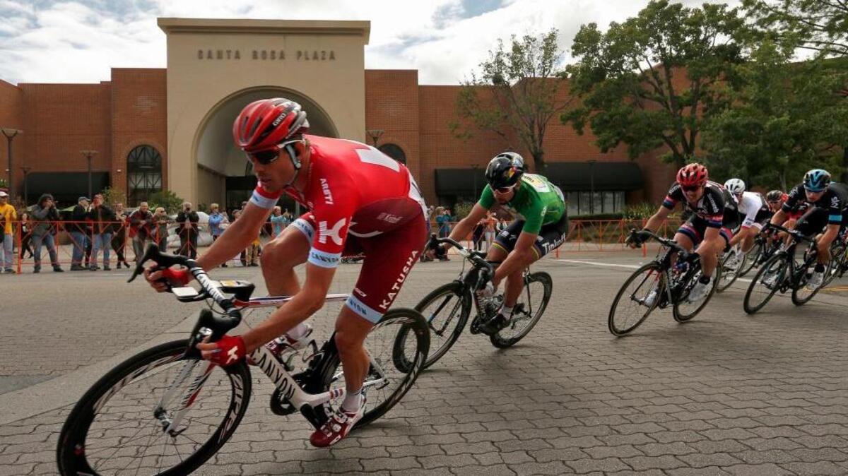 Alexander Kristoff, left, turns in front of the Santa Rosa Plaza during Stage 7 of the Tour of California cycling race in Santa Rosa, Calif., on Saturday, May 21, 2016. Kristoff won the stage.